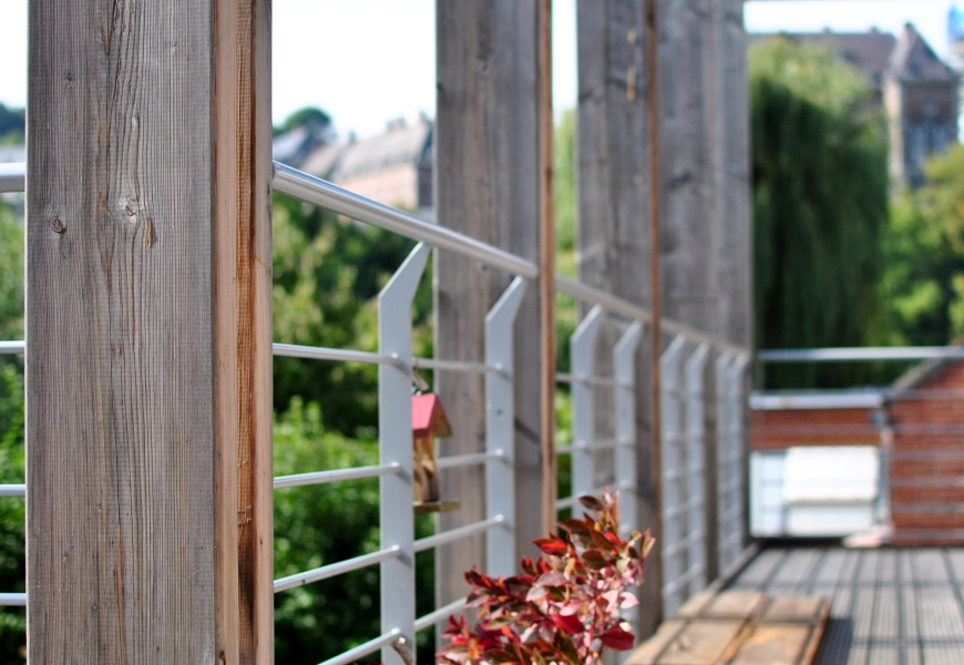 Maison à ossature bois avec terrasse en bois