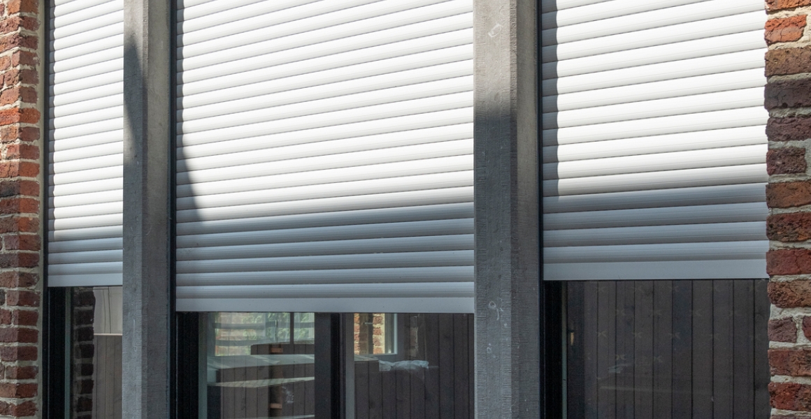 Portes et fenêtres en PVC-aluminium et volets intégrés à Ciney